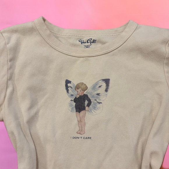 Brandy Melville Off White Creme “I don’t care” fairy graphic baby tee, small - Picture 3 of 7